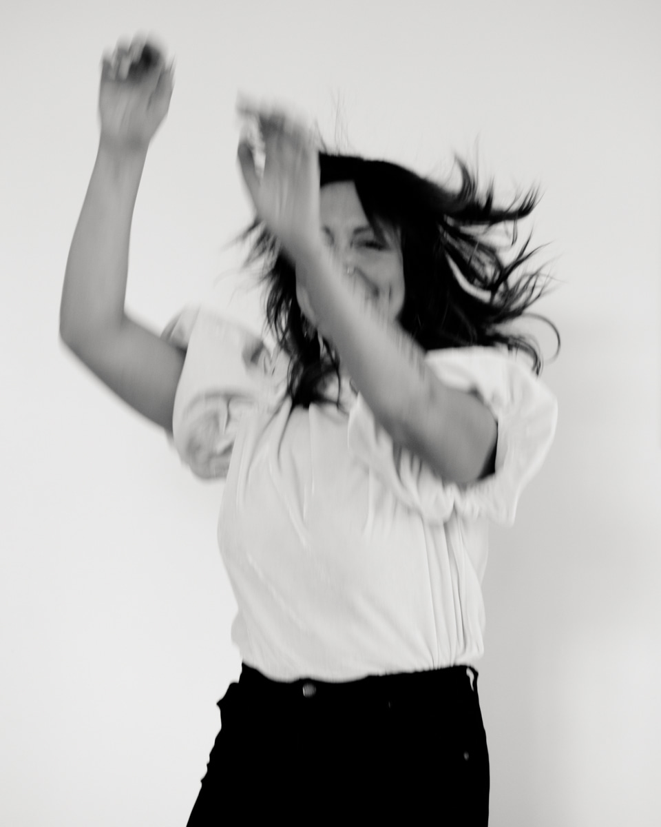 Woman dancing to release stress.